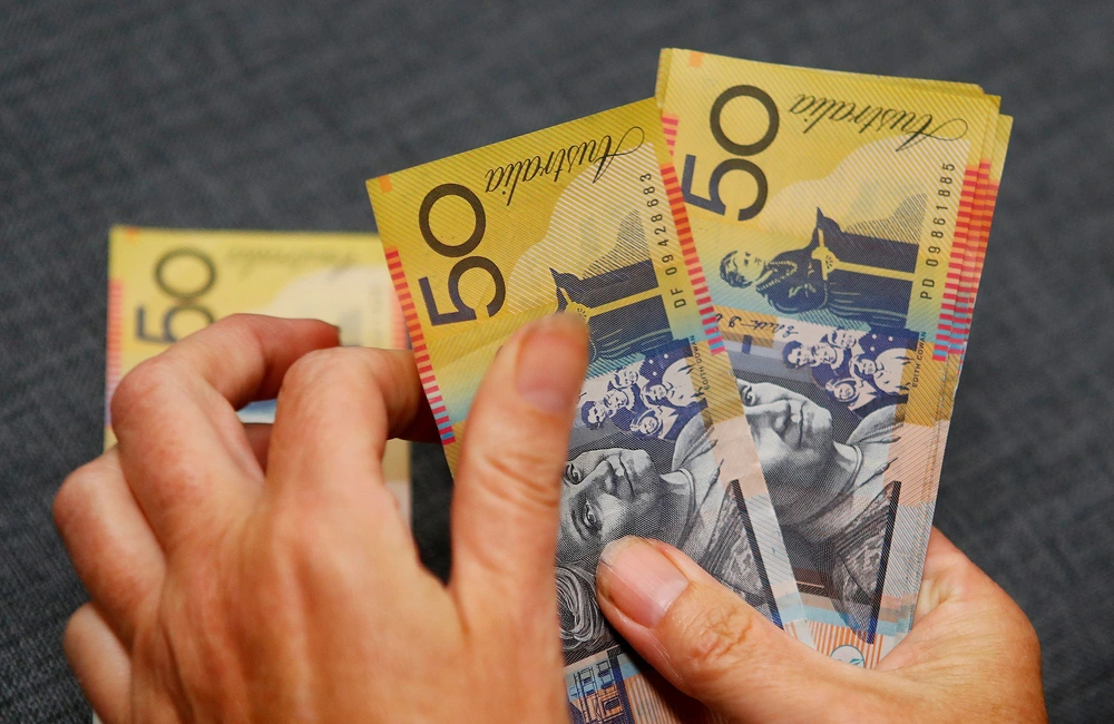 How the fall in the Aussie dollar impacts investors